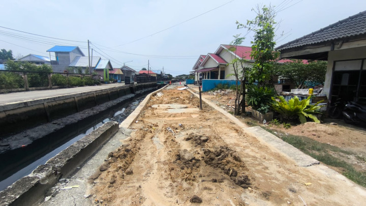 Akhirnya Jalan Ambrol di TLI Diperbaiki, Pakai DTT Rp2,5 Miliar 